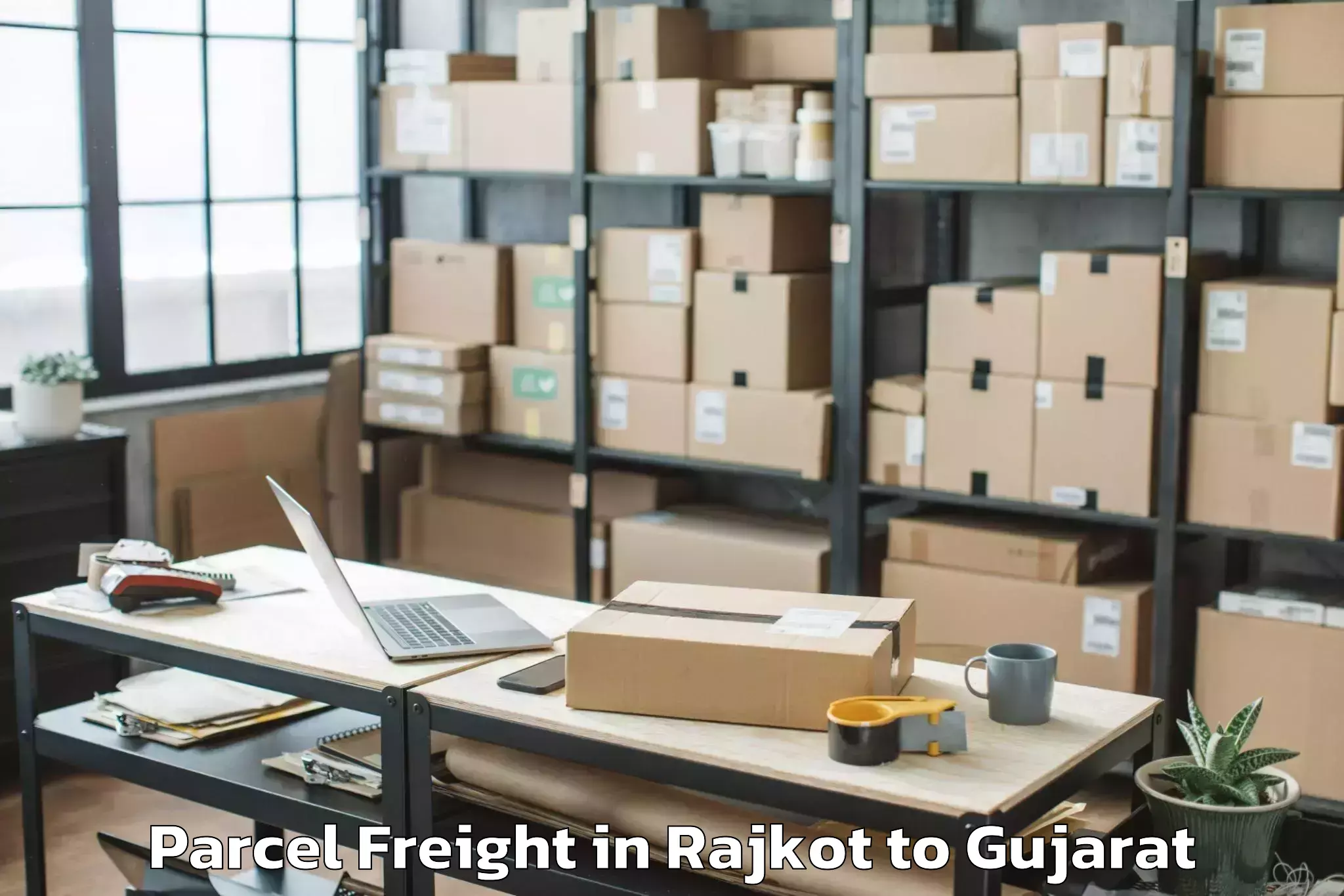 Leading Rajkot to Abhilashi University Ahmedabad Parcel Freight Provider